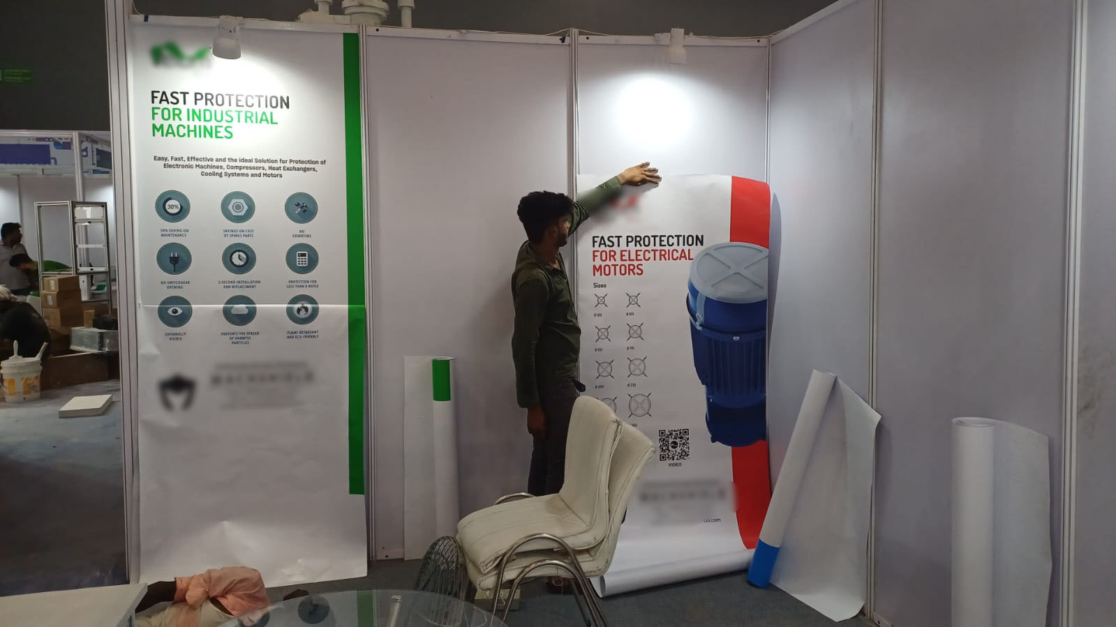 On-site vinyl panel installation — machine-protection covers exhibitor — Exhibition Prints