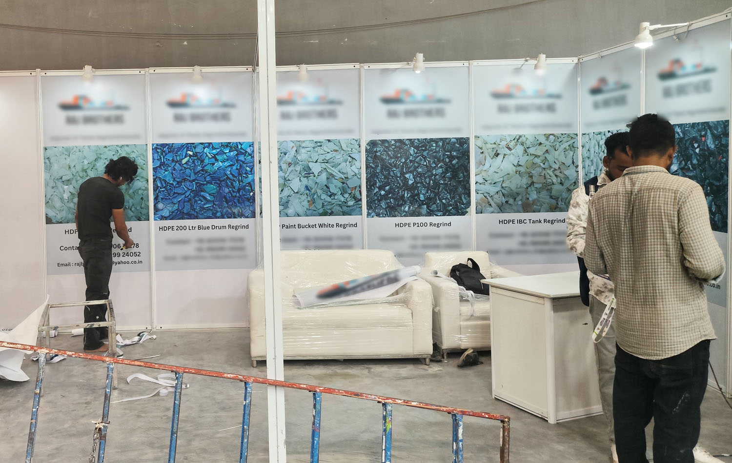 Plastics recycler stall — HDPE regrind product panels with photo graphics — Exhibition Prints
